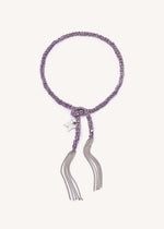 Silver Freedom lucky bracelet with butterfly freedom charm on white background.