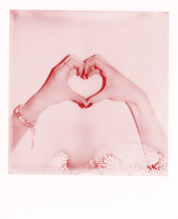 Millenial hand sign for love