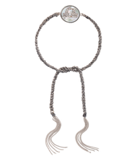 18k white gold diamond-cut chain, hand braided with grey silk, and a pavé grey diamond incrusted libra zodiac symbol on a mother of pearl medallion on a white background