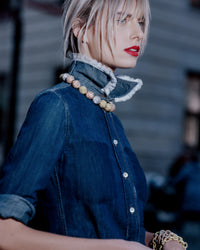 semi close-up, 18k yellow, white and rose downtown gramercy necklace modelled around the neck 