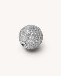 18k white gold florentine frosted finish sphere on white background