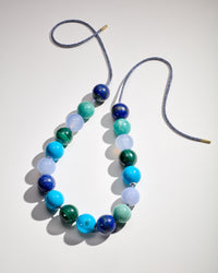 East village downtown necklace including Lapis lazuli, amazonite, Chalcedony and Malachite semi precious spheres, with sky coloured enamel spheres