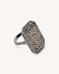 18k emerald cut black florentine frosted finish gold ring with white and grey diamonds on white background