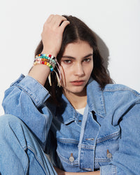 Multiple Forte beads bracelet collections, styled together on wrist