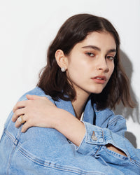 18k white gold florentine frosted finish medium studs modelled