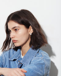 18k white gold florentine frosted finish medium studs modelled