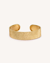 18k yellow florentine frosted finish gold small cuff bracelet on white background 