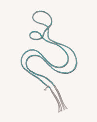 18k white gold lucky wisdom necklace on white background