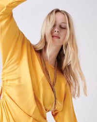 18k gold lucky necklace collection modelled together