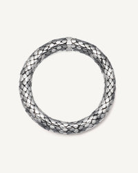 18k black and white gold shiny twister luxe bracelet on white background