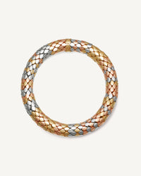 18k yellow, white and pink gold shiny twister luxe bracelet on white background