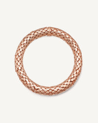 18k rose gold shiny twister luxe bracelet on white background
