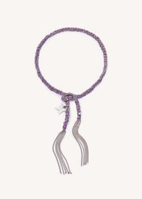 Silver Freedom lucky bracelet with butterfly freedom charm on white background.