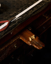 18k yellow florentine frosted finish gold tutto per te ring on atelier work bench