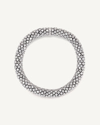 18k white gold Twister Luxe bracelet encased in pavé white diamonds on white background