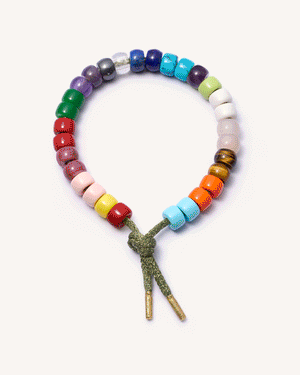 forte beads necklace maker with leaf lurex tie cord with 18k yellow gold caps on white background