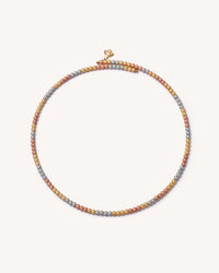 18k yellow, white and rose gold open beaded choker on white background