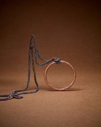 18k rose florentine frosted finish gold large round link with lucky necklace saddle brown background