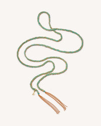 18k yellow gold lucky wisdom necklace on white background