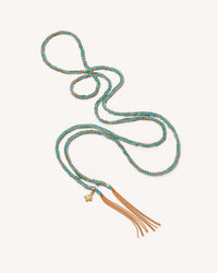 18k yellow gold lucky sprezzatura necklace on white background