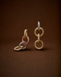 18k yellow florentine frosted finish gold three round links and yellow, white and rose gold three round links, with 18k florentine frosted finish yellow and white gold round huggies  earring 