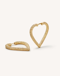 18k yellow florentine frosted finish gold small cuore hoop earrings on white background