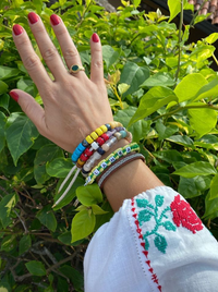 Margherita forte beads bracelet with moon lurex tie cord and 18k yellow gold caps modelled