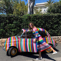 Mira forte bead bracelet and moon lurex tie cord with 18k white gold caps modelled with multicoloured rainbow car