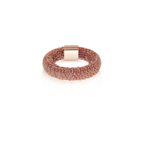 Blush woven slide ring made from woven silk and 18k rose gold on white background 