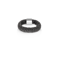 Black woven slide ring made from woven silk and 18k white gold on white background 