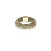 Turquoise woven slide ring made from woven silk and 18k yellow gold on white background 