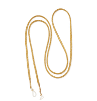 Sun lurex glass cord with 18k yellow gold tips on white background