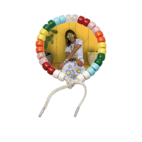 Mira forte bead bracelet and moon lurex tie cord with 18k white gold caps on white background